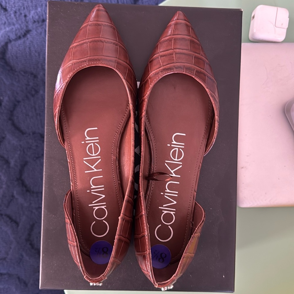 Calvin Klein brown flats size 8.5